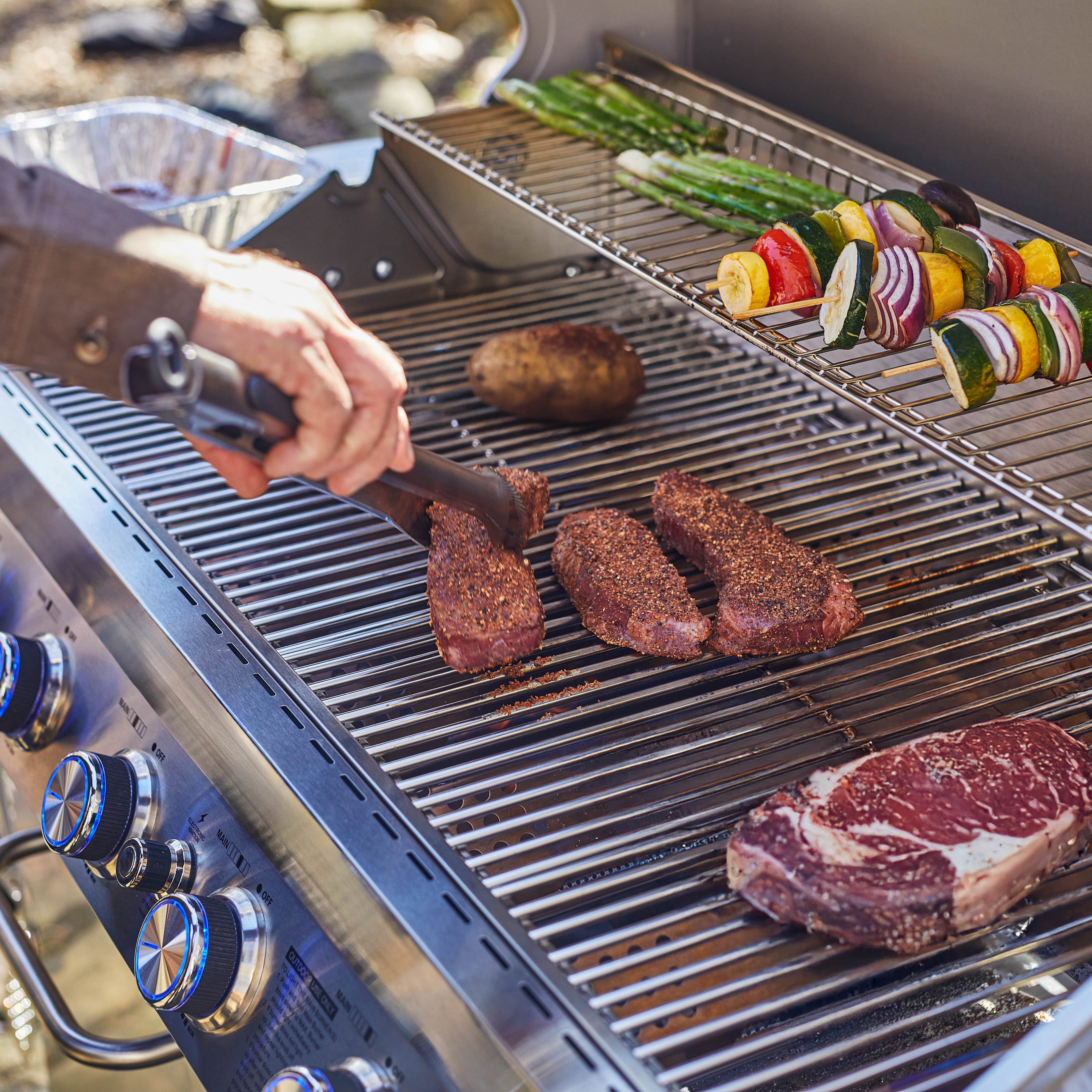 Monument Grills 6+1 Burner Propane Gas Grill  84,000 BTU Stainless Steel Outdoor Patio Barbecue Grill  LED Controls , Free Rotisserie Kit , and Easy Cleanup , 77352 Monument Grills