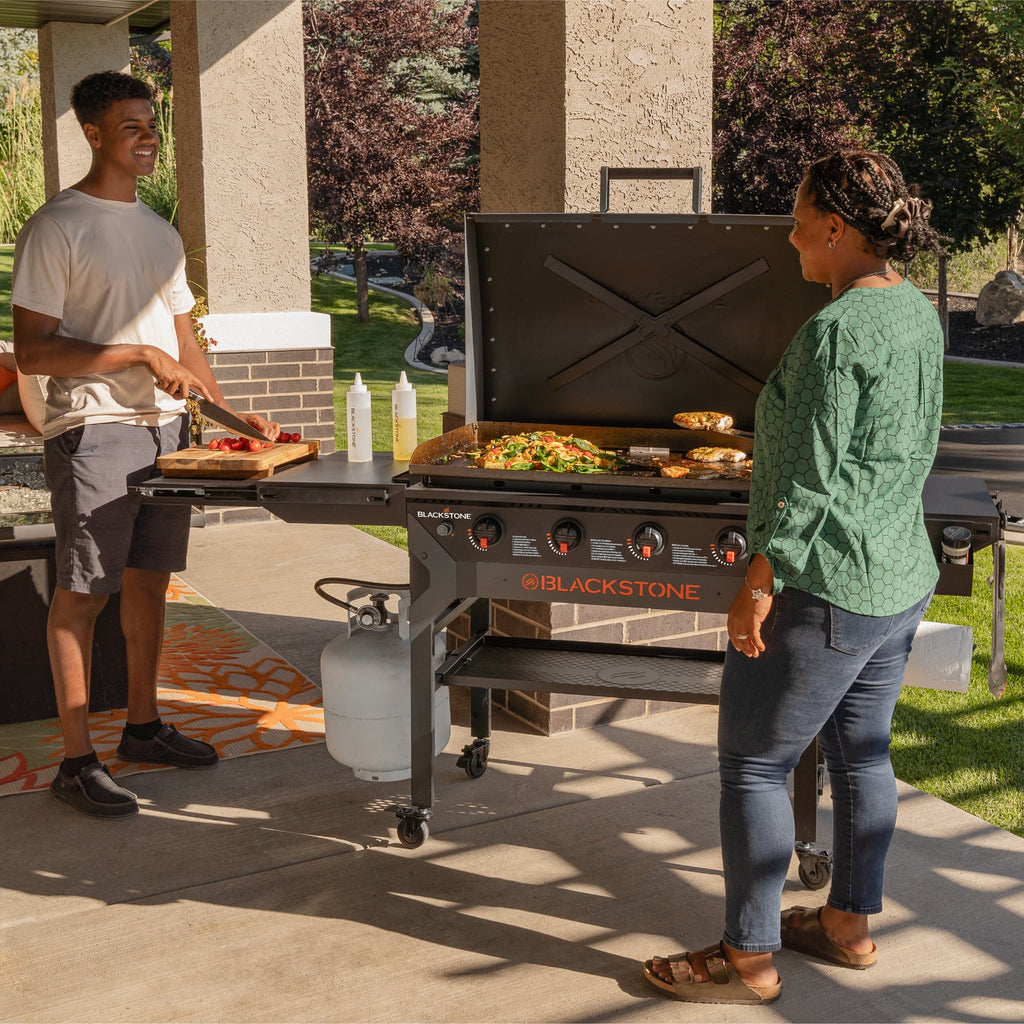 Blackstone Iron Forged 4 Burner Liquid Propane Outdoor Griddle with Hood Black Blackstone